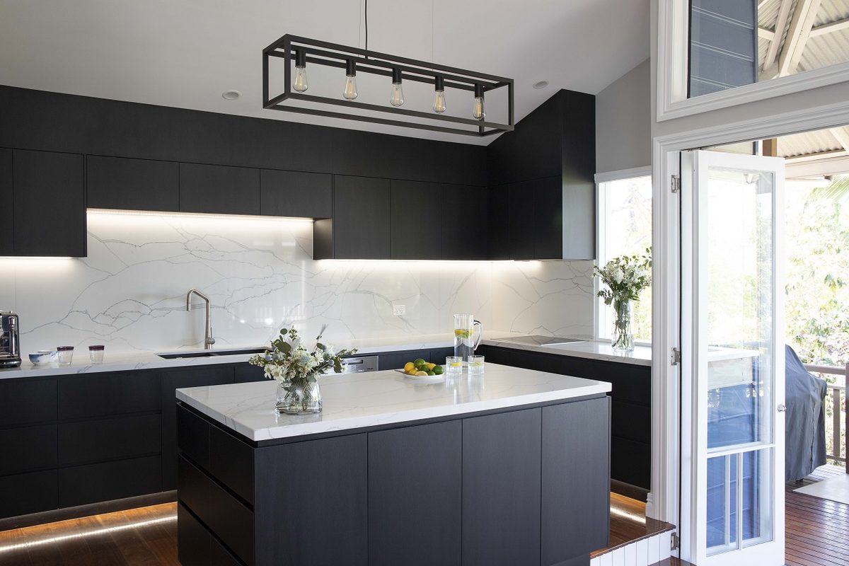 Modern kitchen renovation with island bench, sink and mixer tap — Scarborough Plumbing Brisbane Northside